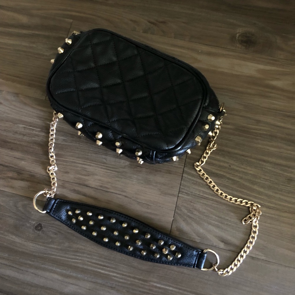 Black and gold studded purse